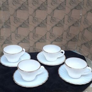 8 pc. Anchor Hocking Suburbia Fire King Swirl  gold trim 6" saucers & cups